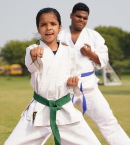 Young lady practicing karate